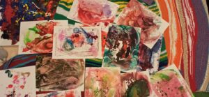 Strick- und Enkaustic Bilder